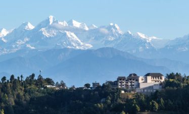 Himalaya Ranges with the White House surrounded the green environment.